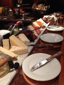 Gourmet cheese selections at Coq d'Or